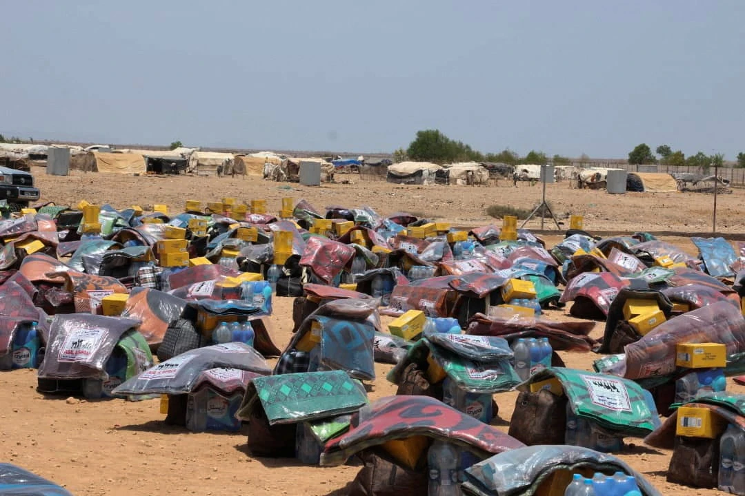 Packages of humanitarian supplies are arranged before being distributed to people fleeing clashes between Houthi fighters and Saudi-backed Yemeni government forces, at the Markazi refugee camp after arriving in Djibouti, September 18, 2026. REUTERS/Abdourahim Arteh