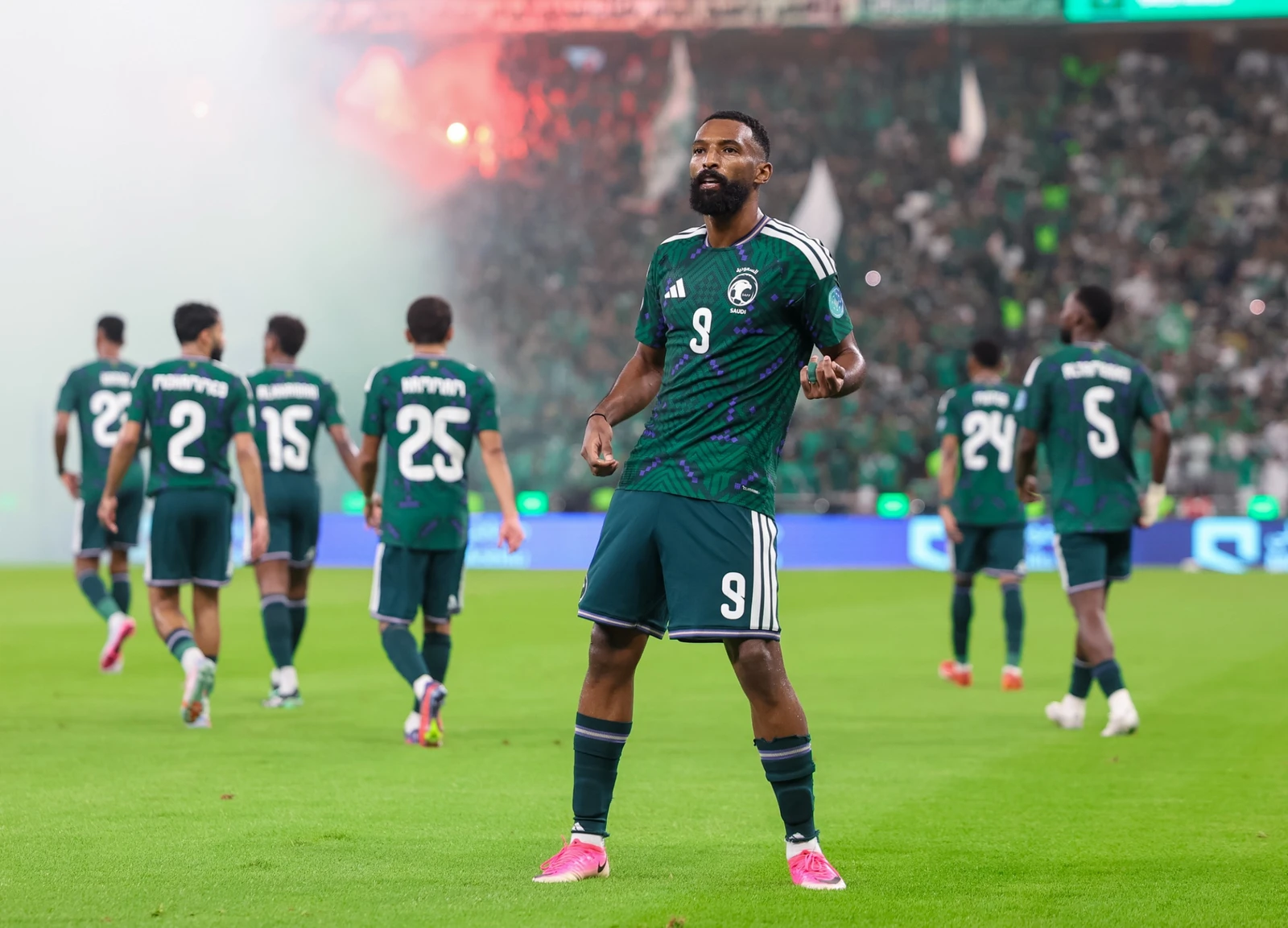 Feras Al-Brikan makes his trademark celebration after scoring Saudi Arabia's second goal. (X: @SaudiNT)