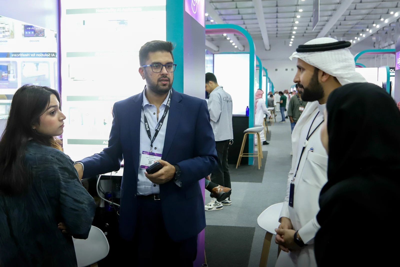 SparkleHaze Chief Operating Officer Adil Khalid showcases the WooHoo platform to visitors at the LEAP conference. (Supplied)