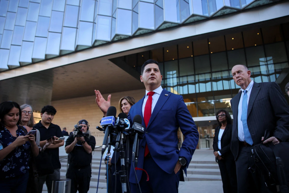 Bill Essayli, First Assistant US Attorney for the Central District of California, speaks with the media after a court hearing on the DOJ's lawsuit that seeks to block California from counting any mail ballots for the November 3 midterm elections from more than 20,000 registered voters the Trump administration alleges are likely noncitizens in Los Angeles, California. (REUTERS)