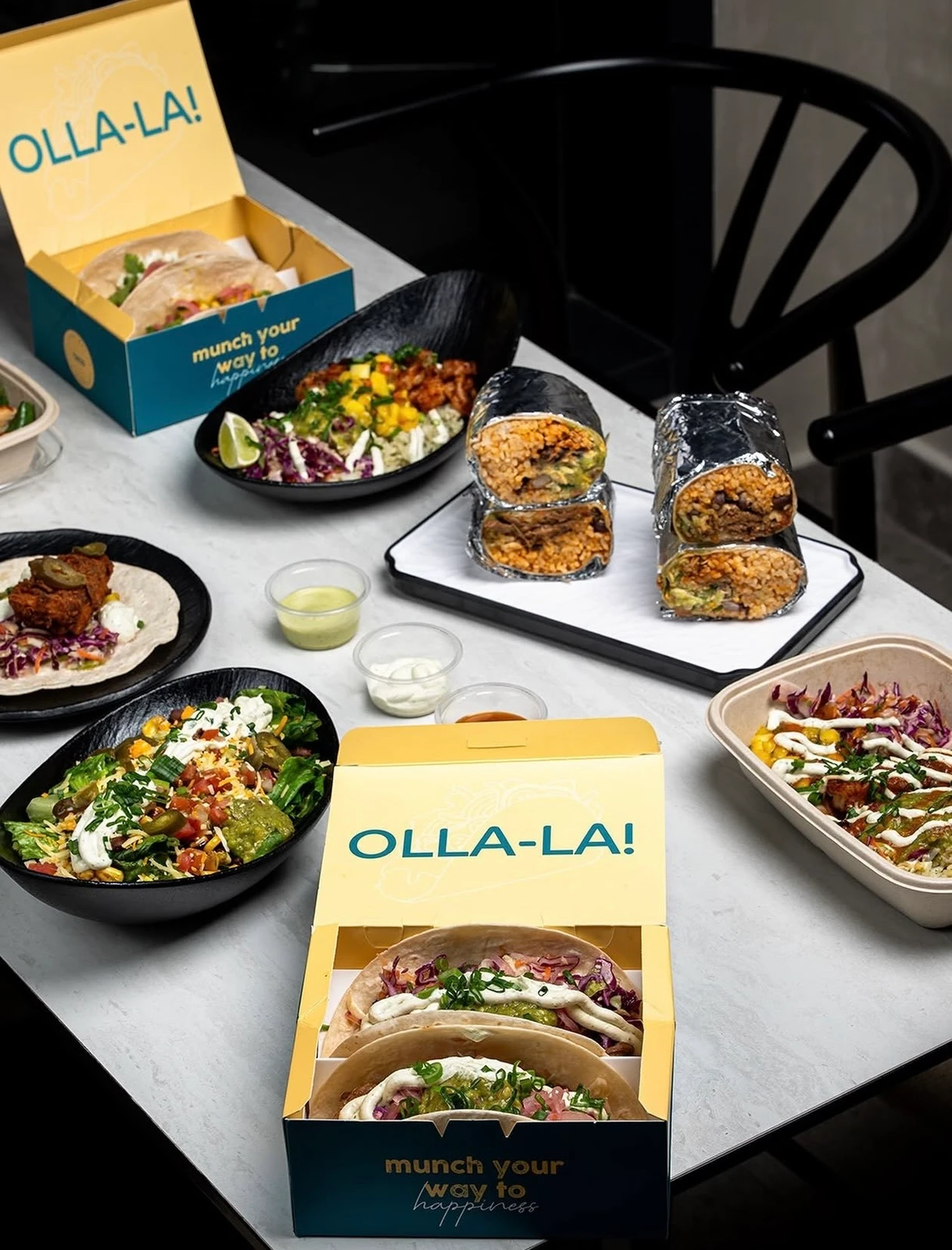 Olla's bowl, burrito, and taco selections. (Instagram: @olla.saudi)