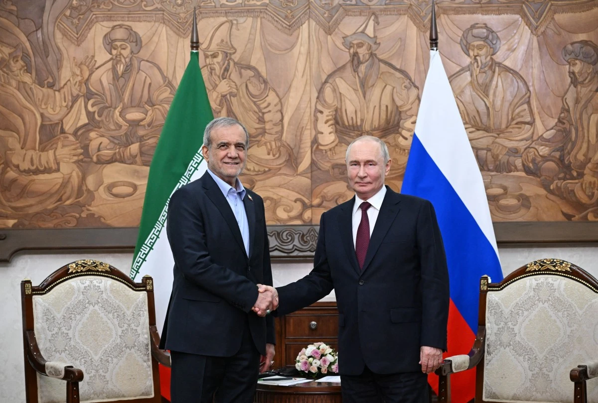 Iran president offers US olive branch, hails Russian support