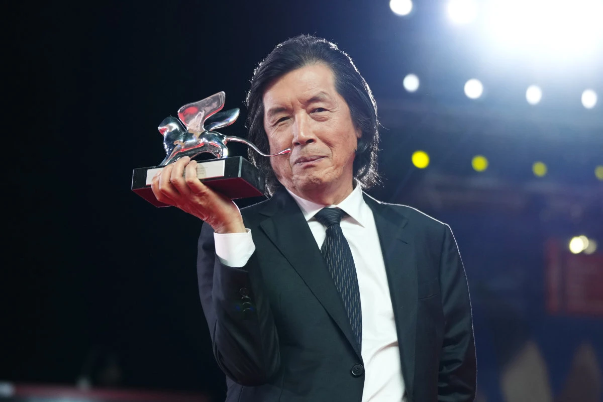 Director Lee Chang-dong, winner of the grand jury prize for the film 'Possible Love', poses for photographers at the awards photo call during the closing ceremony of the 83rd edition of the Venice Film Festival. (Photo by Scott A Garfitt/Invision/AP)