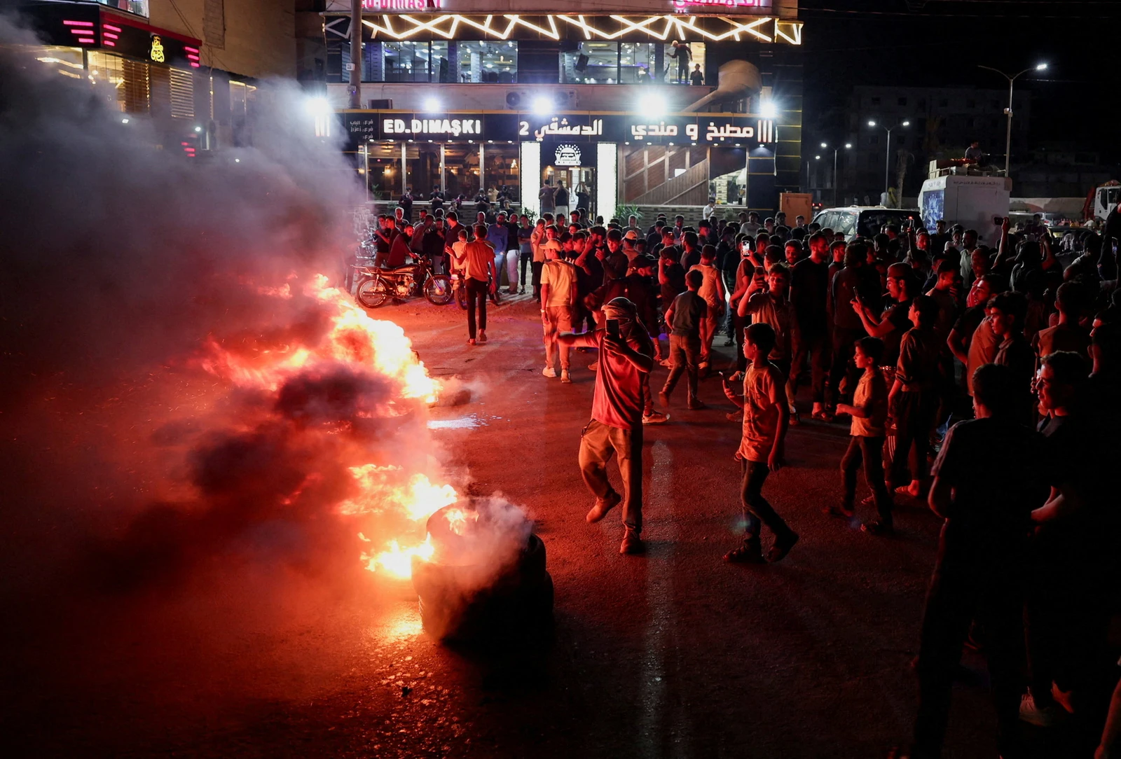 In the Aleppo countryside, people took to the streets, chanting against the price hikes and closing roads in protest. (Reuters)