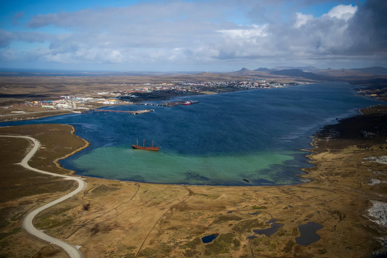 Along the Beagle Channel, an icy stretch of water at the southern tip of the Americas, a concrete slab rises from hills covered in low, brownish scrub. (AFP/File)