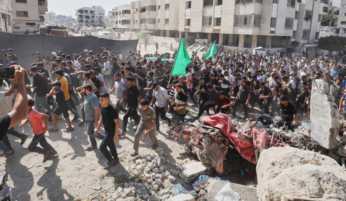 Palestinians carry the body of Ahmad Al-Batsh, a Qassam Brigades commander in Jabaliya, the military wing of Hamas, during his funeral after he was killed in an Israeli airstrike, in Gaza City, Tuesday, Sept. 15, 2026. (AP)