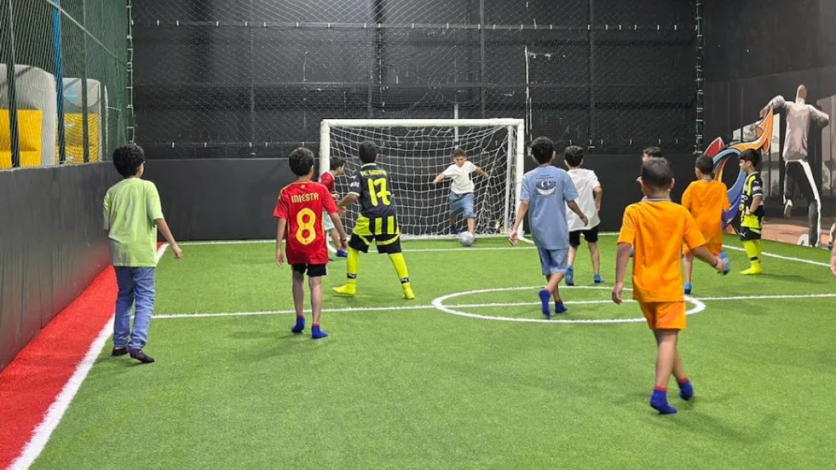 There is also a football area for a more traditional game, giving children another space to run around and play together. (Supplied)