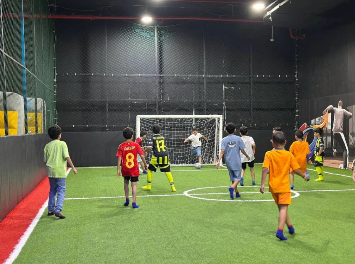 There is also a football area for a more traditional game, giving children another space to run around and play together. (Supplied)