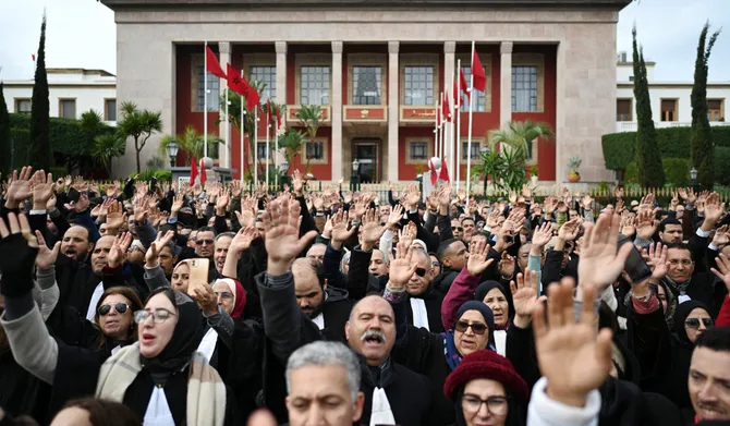 Lawyers take part in a protest in front of the Moroccan parliament in Rabat on February 6, 2026. (AFP)