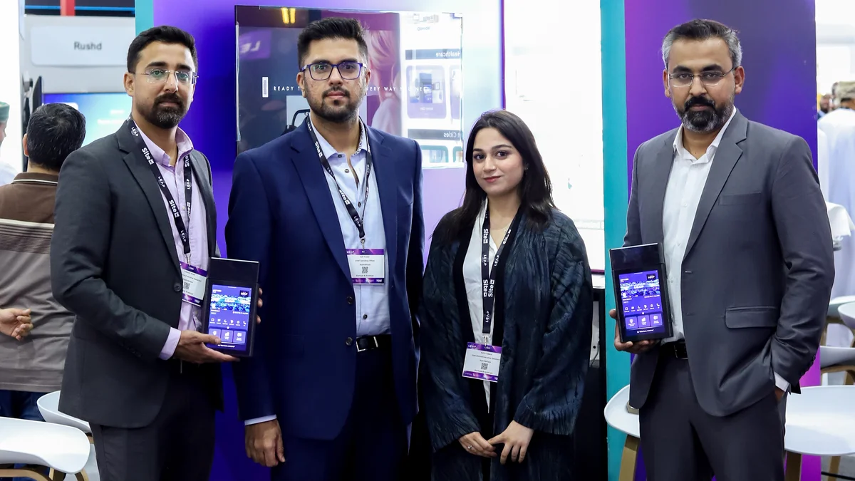 SparkleHaze Chief Operating Officer Adil Khalid showcases the WooHoo platform to visitors at the LEAP conference. (Supplied)