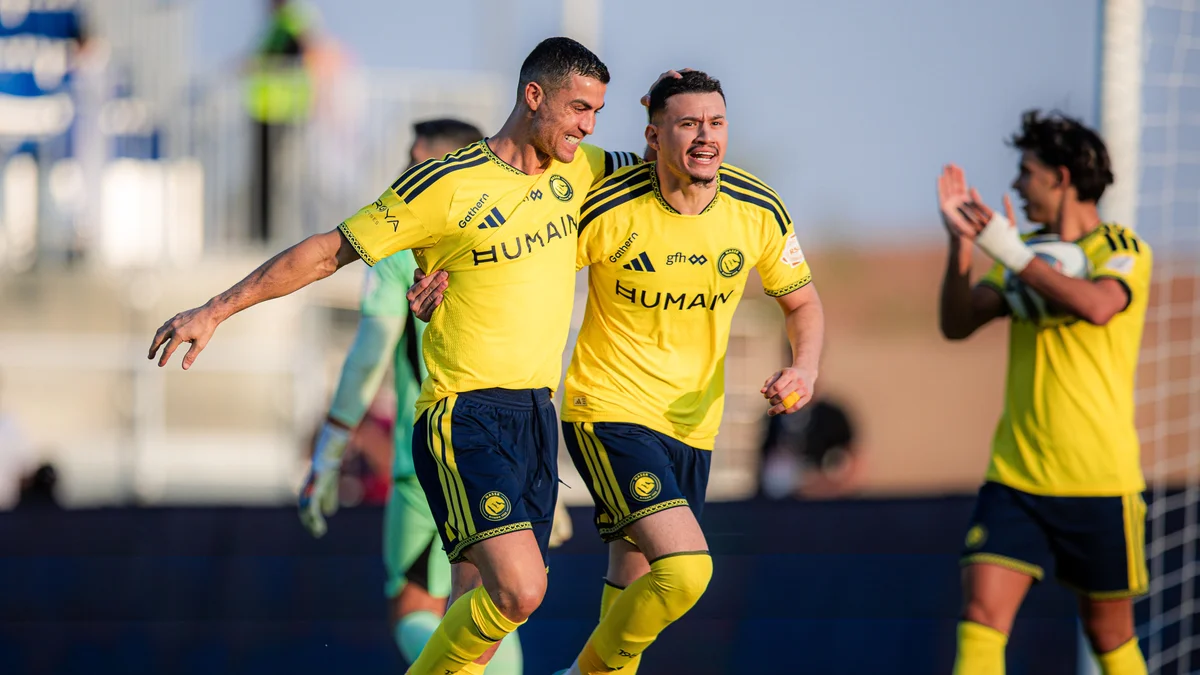 Ronaldo and Abdullah Al-Hamddan celebrate after the latter opens the scoring. (SPL)
