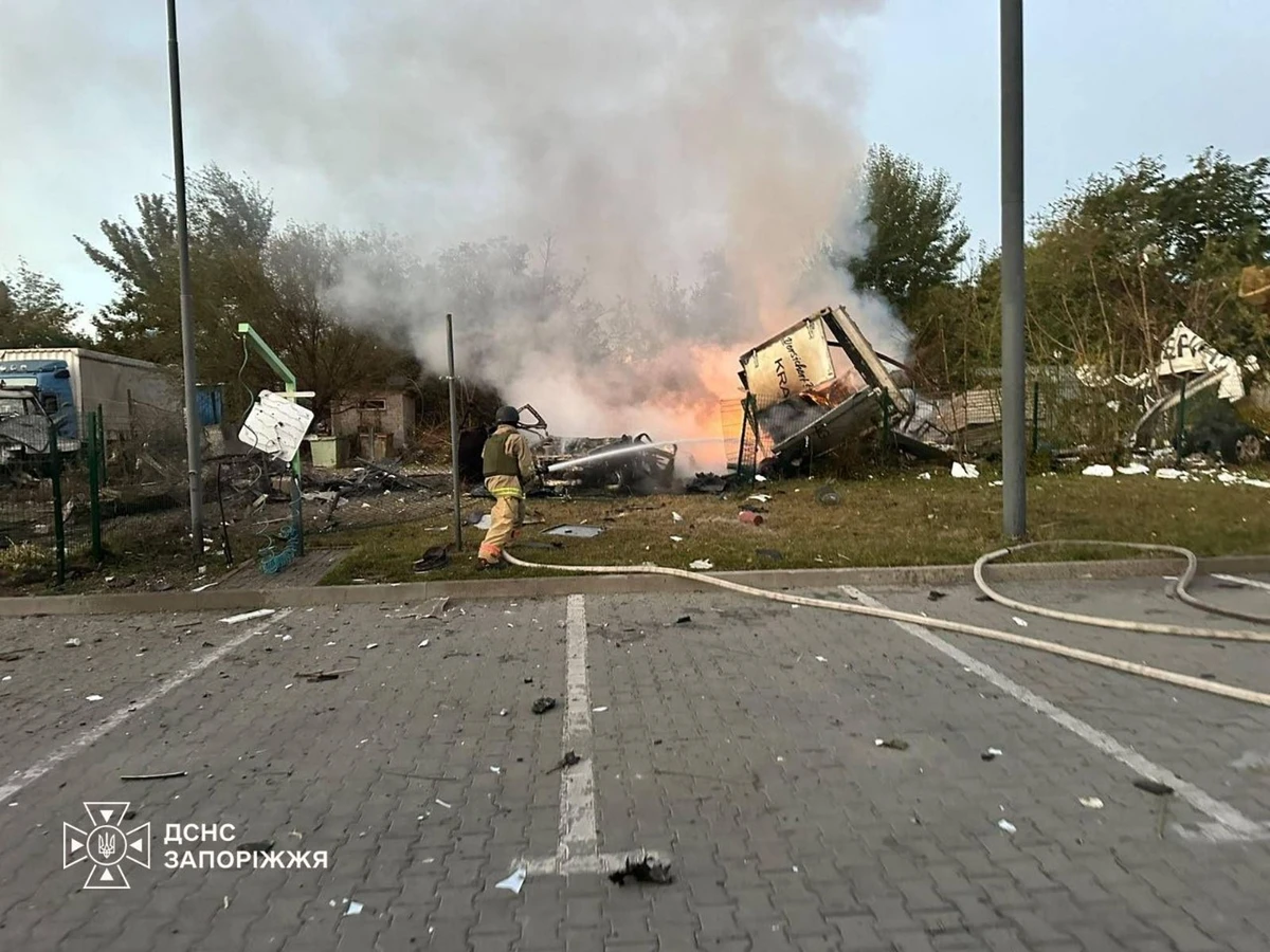 In this photo provided by the Ukrainian Emergency Services on Tuesday, Oct. 6, 2026, rescue workers put out a fire of cars after a Russian strike on gas station in Zaporizhzhia, Ukraine. (AP)