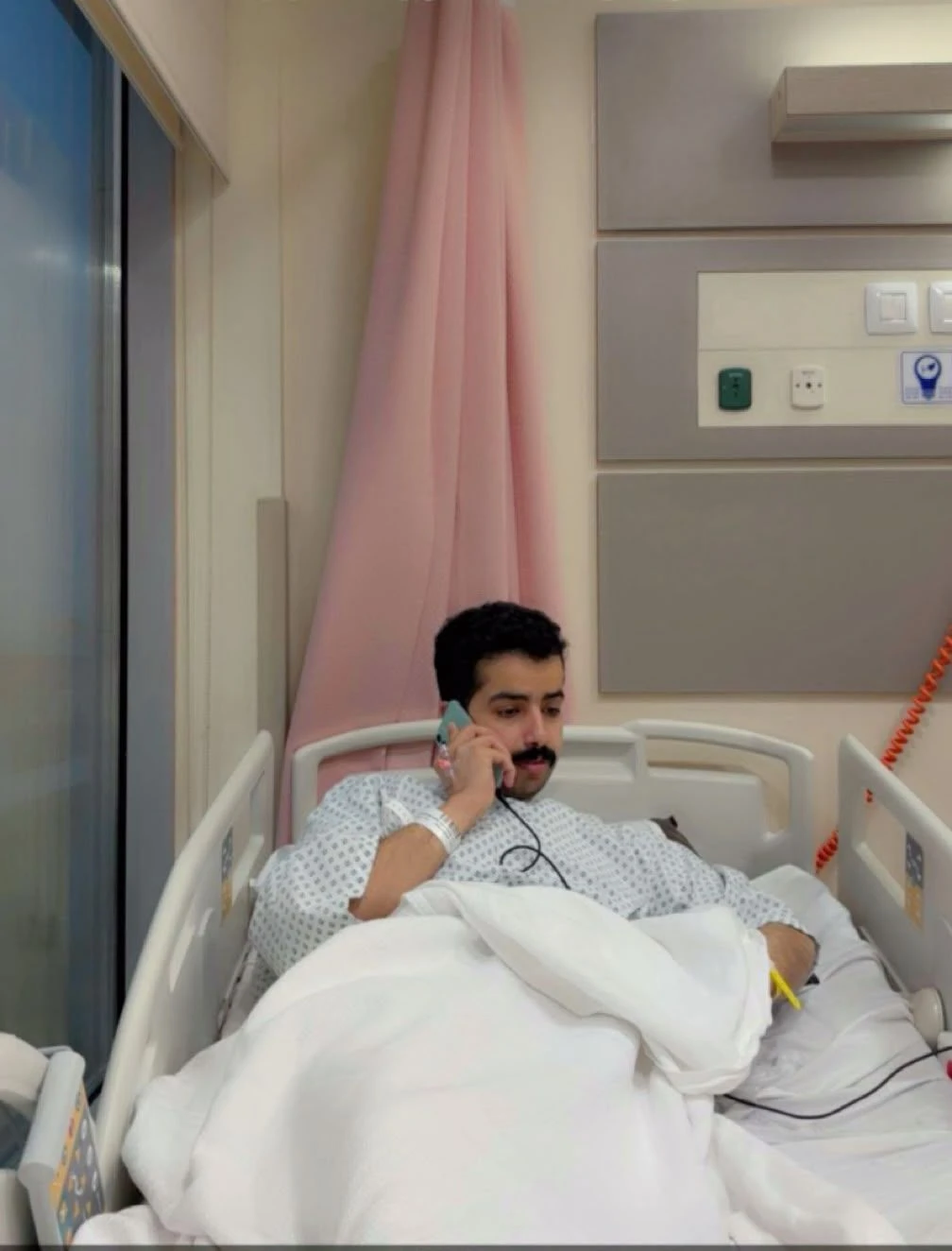 Mohammed Saleh Al-Yami received medical treatment after sustaining injuries while helping passengers during the airport attack.