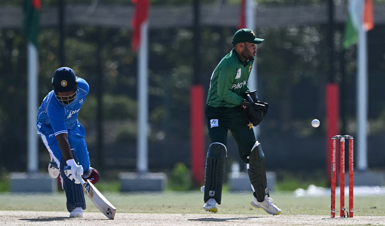 India's Sanju Vishwanadh (L) avoids a runout during the men's cricket final match between Pakistan and India during the 2026 Asian Games at the Korogi Athletic Park in Nisshin on October 3, 2026. (AFP)