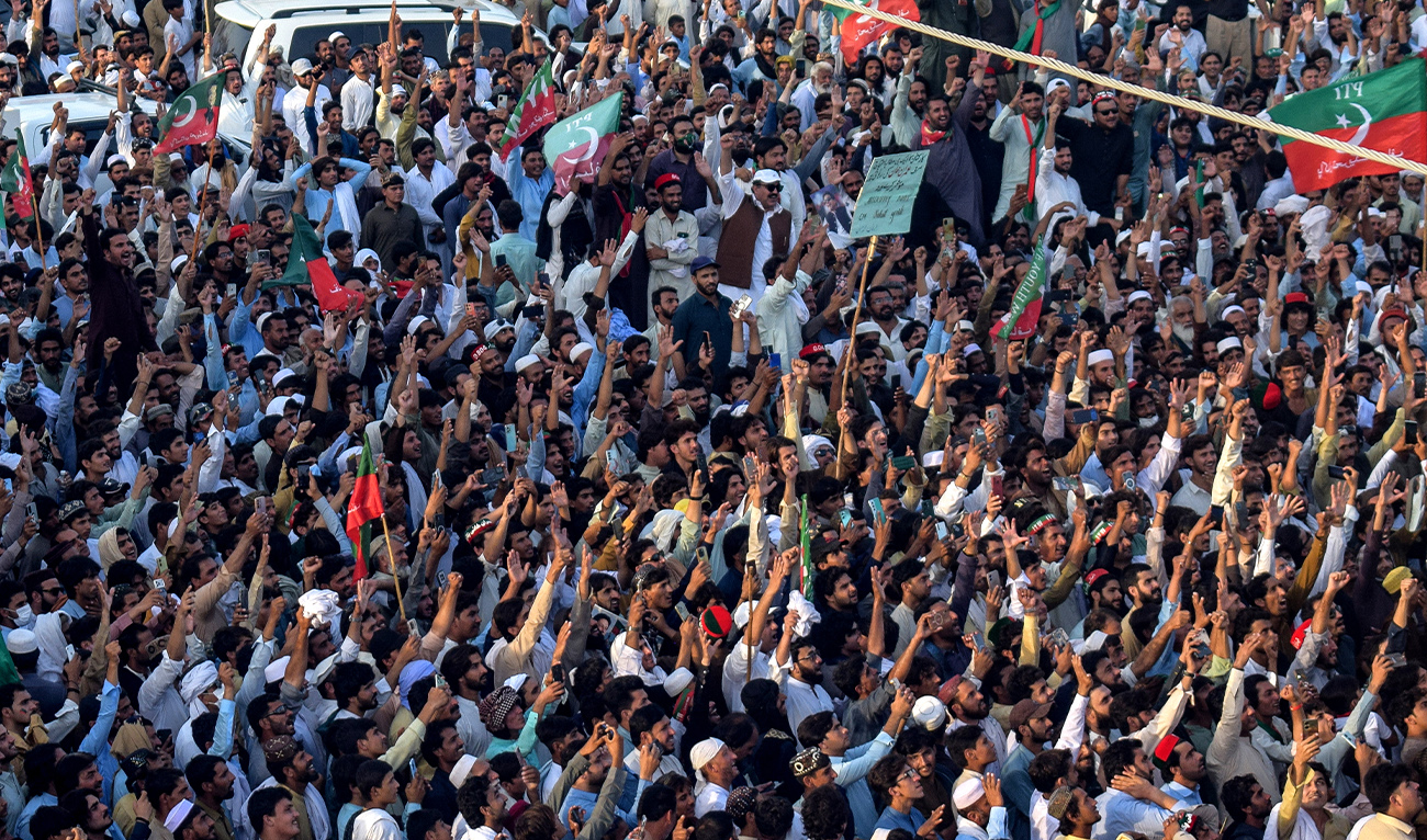 Supporters of jailed former prime minister Imran Khan's Pakistan Tehreek-e-Insaf (PTI) party take part in a long march in Lakki Marwat of Pakistan's Khyber Pakhtunkhwa province on October 4, 2026. (AFP)