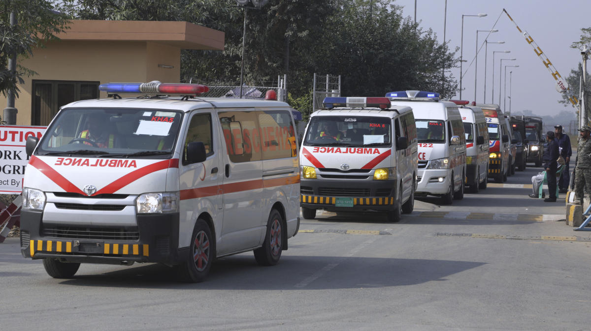 A convey of ambulances cary the bodies of men founded on Saturday in Turbat, transporting to their home towns, in Lahore, Pakistan, Sunday, Nov. 19, 2017. A government spokesman says authorities have found the bodies of five more Pakistanis who were apparently planning to cross into Iran on their way to Europe to seek work as migrant laborers. (AP)