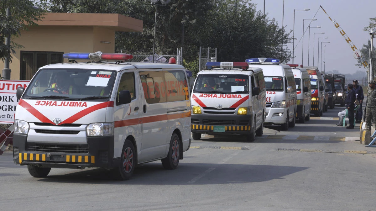 A convey of ambulances cary the bodies of men founded on Saturday in Turbat, transporting to their home towns, in Lahore, Pakistan, Sunday, Nov. 19, 2017. A government spokesman says authorities have found the bodies of five more Pakistanis who were apparently planning to cross into Iran on their way to Europe to seek work as migrant laborers. (AP)