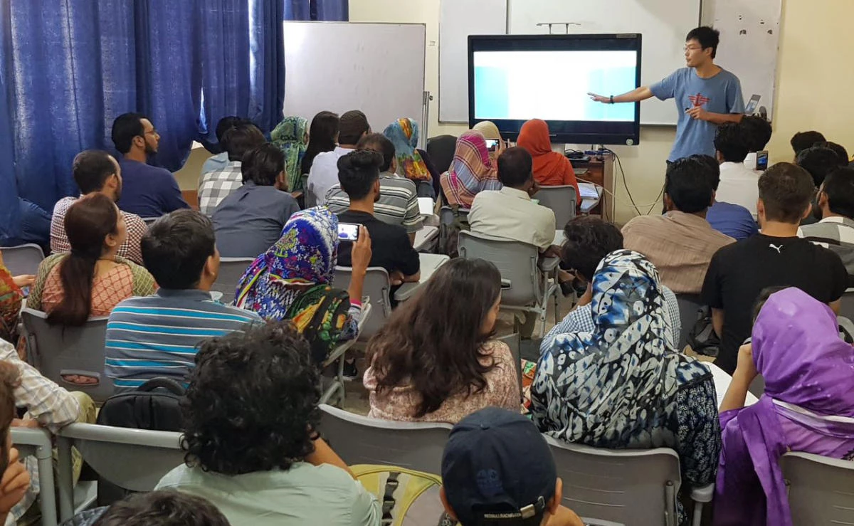 Students listening to a Mandarin instructor in a classroom at the Confucius Institute, University of Karachi. (AN photo)