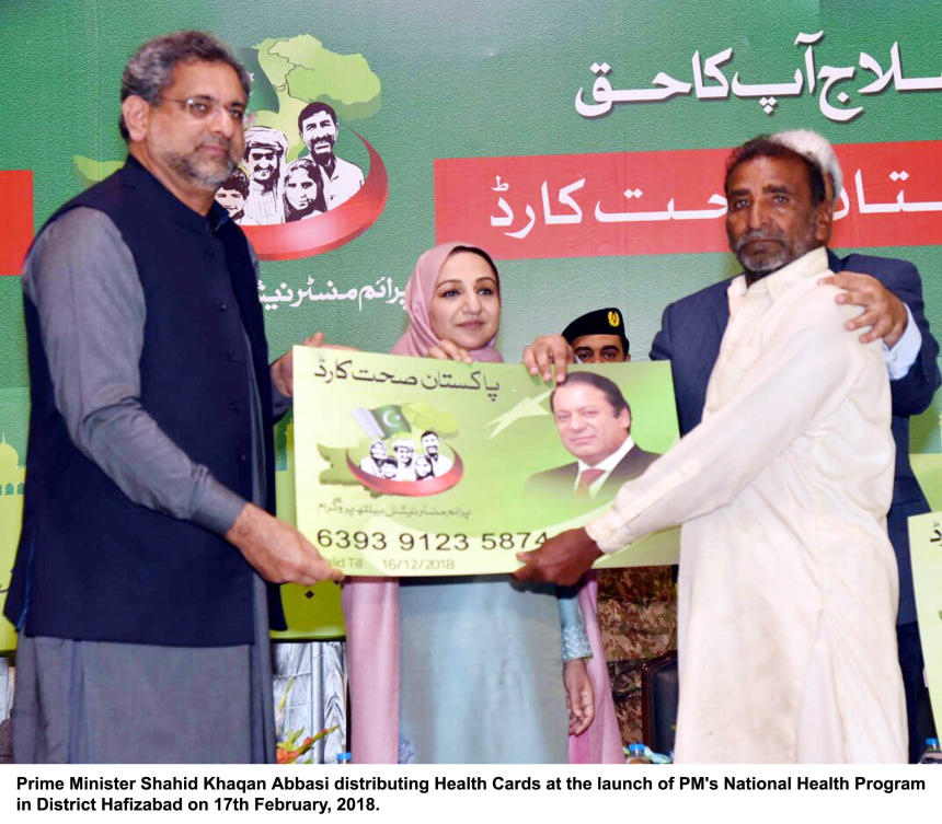 PM Abbasi is distributing health cards in Hafizabad, District of Punjab Province. (Photo courtesy: Press Information Department – Ministry of Information Pakistan)