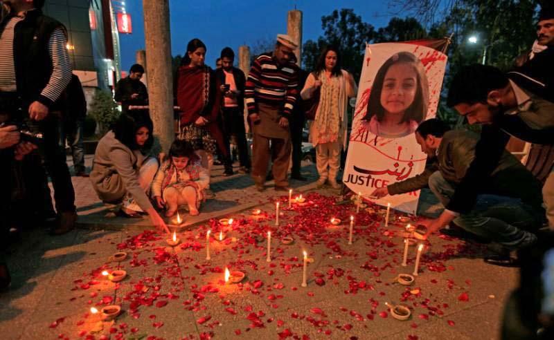 In this file photo, members of Civil Society light candles and earthen lamps to condemn the rape and murder of 7-year-old girl Zainab Ansari in Kasur, during a candlelight vigil in Islamabad, Pakistan Jan. 11, 2018. (REUTERS)