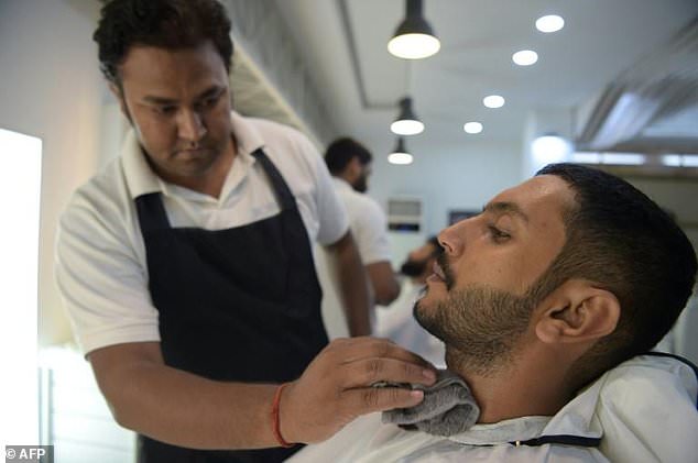 "The Pakistan male is becoming more metrosexual. It is all due to the internet and the age of satellites and and TVs," says one salon owner. (AFP)