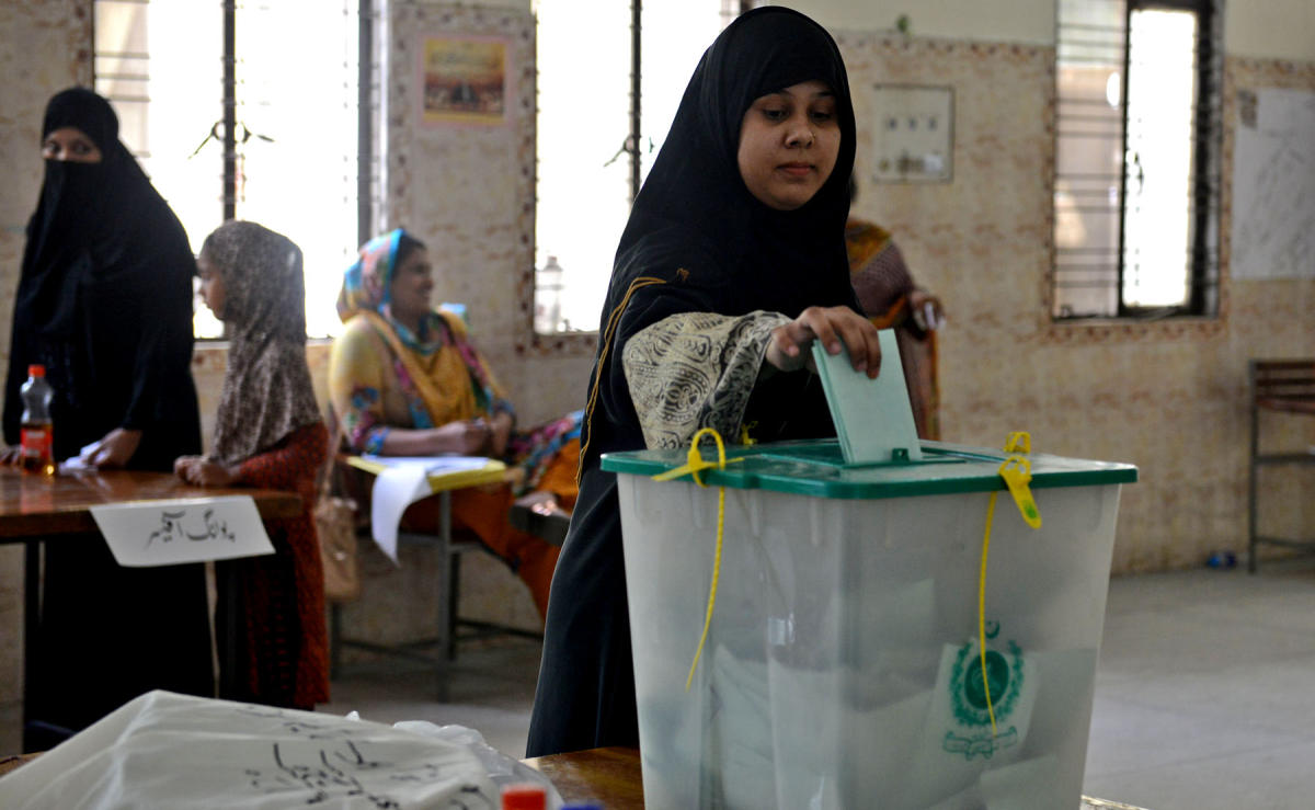 In this file photo, a Pakistani voter casts her ballot in a by-election in Lahore on Sept. 17, 2017. (AFP)