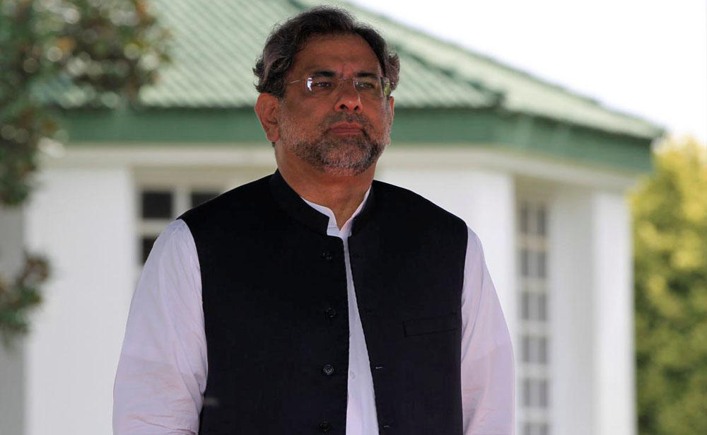 In this file photo, Pakistan’s Prime Minister Shahid Khaqan Abbasi reviews the honor guard in Islamabad, Pakistan Aug. 3, 2017. (REUTERS)