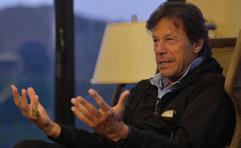 In this file photo, Pakistani cricketer-turned-opposition leader and head of the Pakistan Tehreek-i-Insaf (PTI), Imran Khan, speaks during an interview with AFP at his home in Islamabad on Feb. 5, 2018. (AFP)
