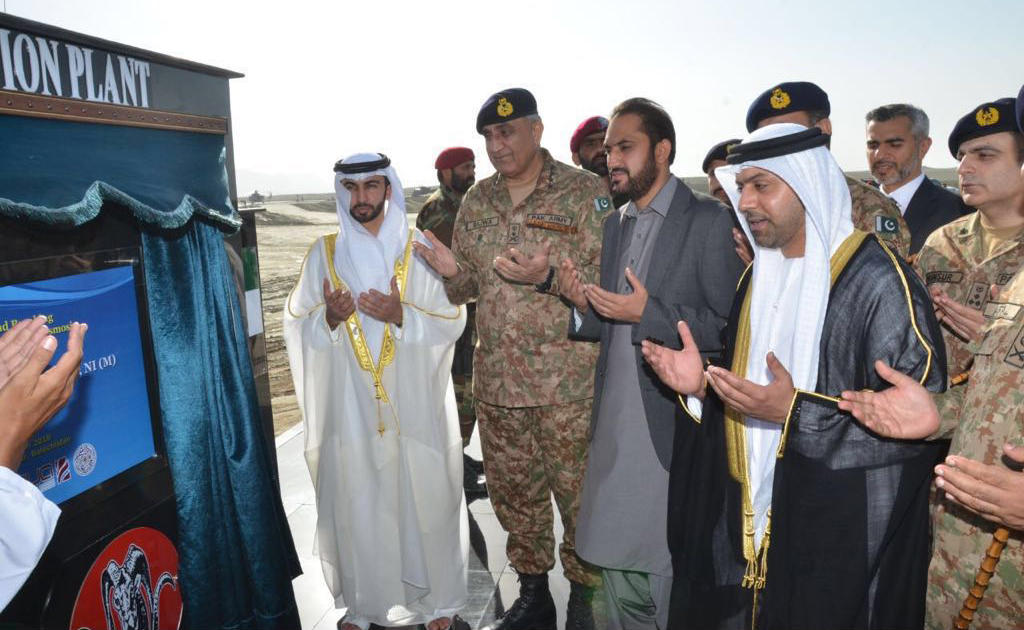 Chief of Army Staff General Qamar Javed Bajwa, UAE Ambassador to Pakistan and Balochistan Chief Minister Mir Abdul Quddus Bizenjo, among others, offer a prayer before laying the foundation stone inaugurating the desalination plant in Gwadar. (Photo courtesy: ISPR)