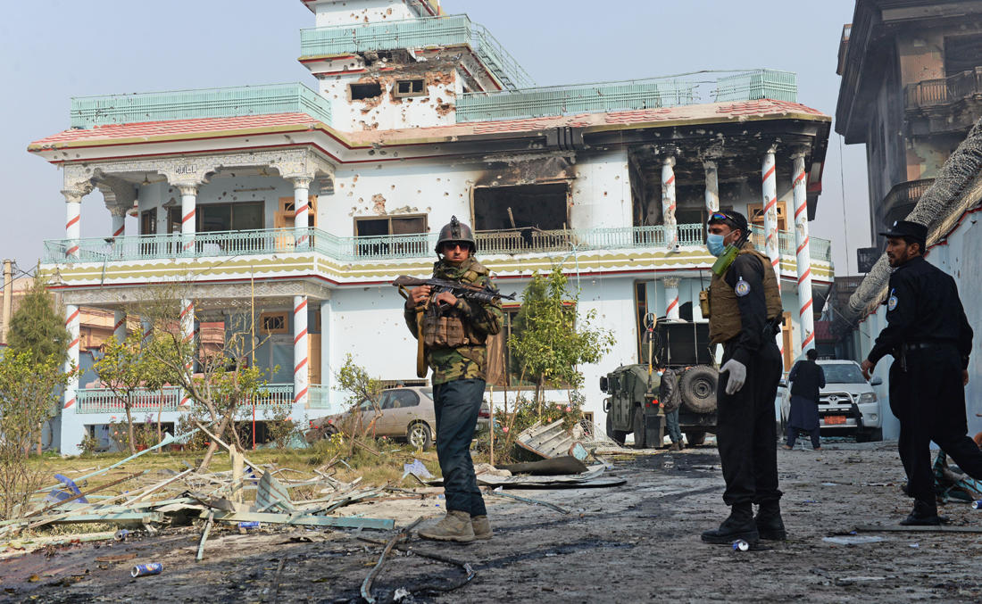 In this file photo, Afghan security forces inspect the site of an attack by Daesh militants at the British charity Save the Children compound in Jalalabad on Jan. 25, 2018. (AFP)