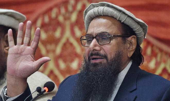 In this file photo, Pakistani head of the Jamaat-ud-Dawa (JuD) organization Hafiz Saeed speaks during a press conference in Lahore. (AFP)