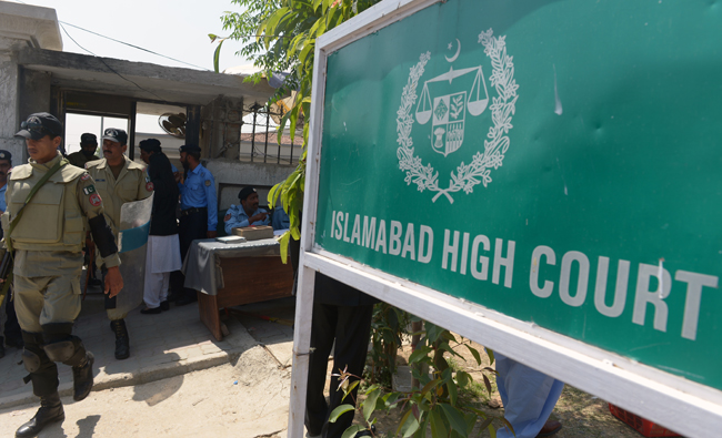 Islamabad High Court ruled on friday that people were required to declare their religion on all official documents and take an oath upon joining the civil service, armed forces or judiciary. (AFP)