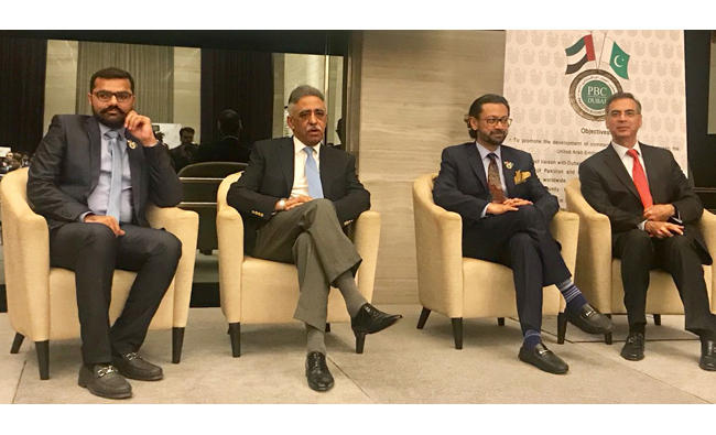 From left to right: Ahmed Shaikhani, Sindh Gov. Mohammed Zubair, Naeem Zaminder and Moazzam Ahmad Khan. (Photos via Pakistan Business Council)