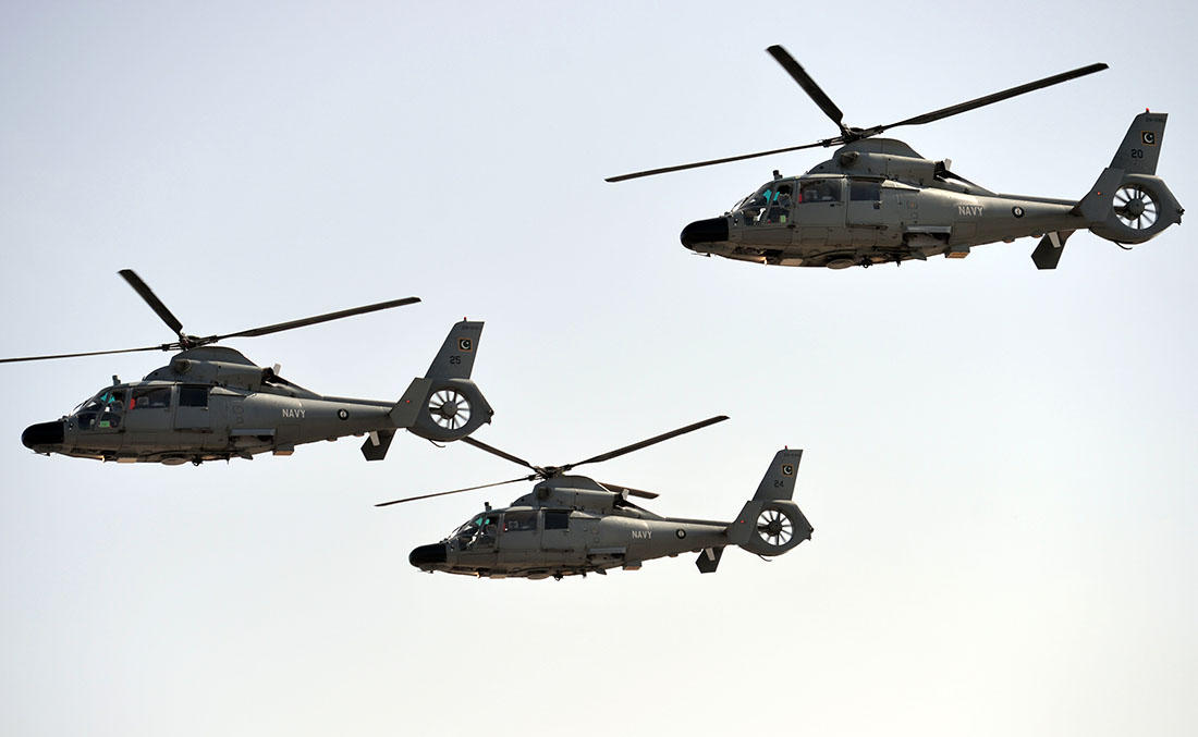 In this file photo, Pakistani Navy helicopters fly past during a Pakistan Day military parade in Islamabad on March 23, 2017. (AFP)
