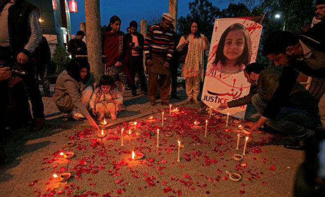 In this file photo, members of Civil Society light candles and earthen lamps to condemn the rape and murder of 7-year-old girl Zainab Ansari in Kasur, during a candlelight vigil in Islamabad, Pakistan on Jan. 11, 2018. (REUTERS)