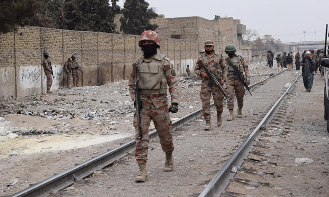 In this file photo, Pakistani paramilitary soldiers patrol near the site of an attack by gunmen in Quetta. (AFP)
