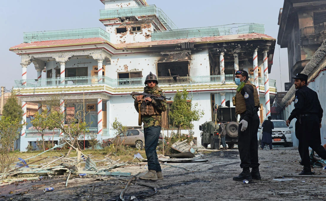 In this file photo, Afghan security forces inspect the site of an attack by Daesh militants at the British charity Save the Children compound in Jalalabad on Jan. 25, 2018. (AFP)