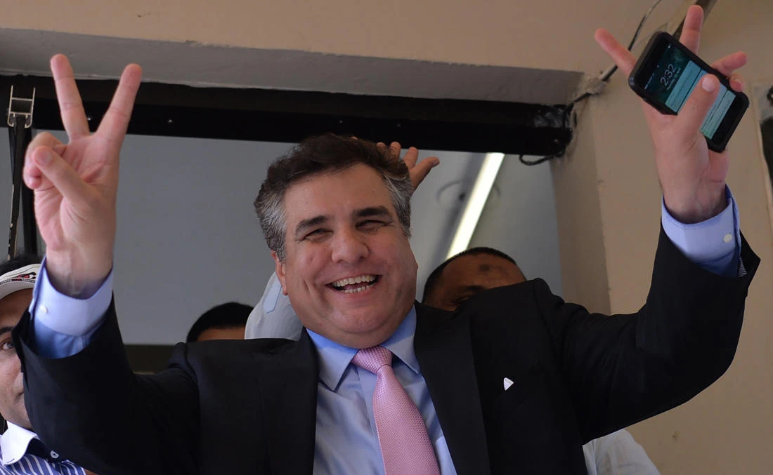In this file photo, leader of ruling party Pakistan Muslim League-Nawaz (PML-N) Daniyal Aziz gestures as he celebrates after a Supreme Court verdict on the Panama Papers case outside the court building in Islamabad on April 20, 2017. (AFP)