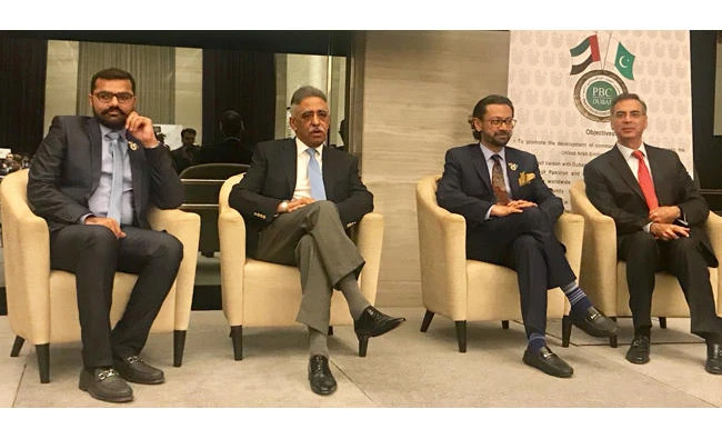 From left to right: Ahmed Shaikhani, Sindh Gov. Mohammed Zubair, Naeem Zaminder and Moazzam Ahmad Khan. (Photos via Pakistan Business Council)