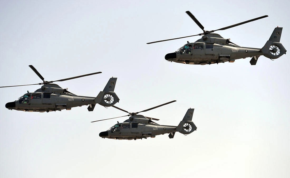 In this file photo, Pakistani Navy helicopters fly past during a Pakistan Day military parade in Islamabad on March 23, 2017. (AFP)