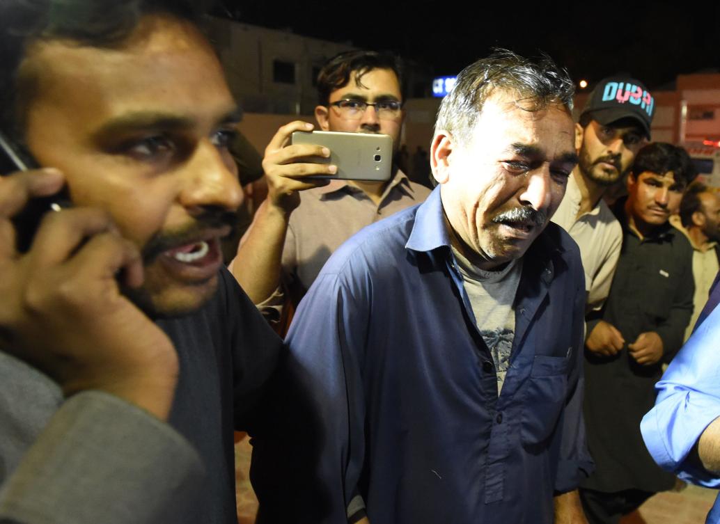 A Pakistani Christian resident mourns the killing of relatives following an attack by gunmen at a hospital in Quetta on April 2, 2018. (AFP)