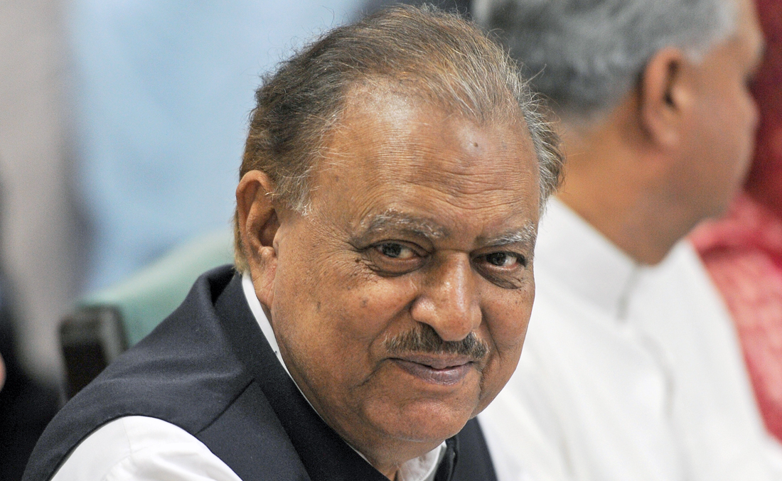 In this file photo, Pakistan candidate for the upcoming presidential election of the ruling Pakistan Muslim League-N (PMLN), Mamnoon Hussain arrives to submits his nomination paper at the High Court in Islamabad on July 24, 2013. (AFP)