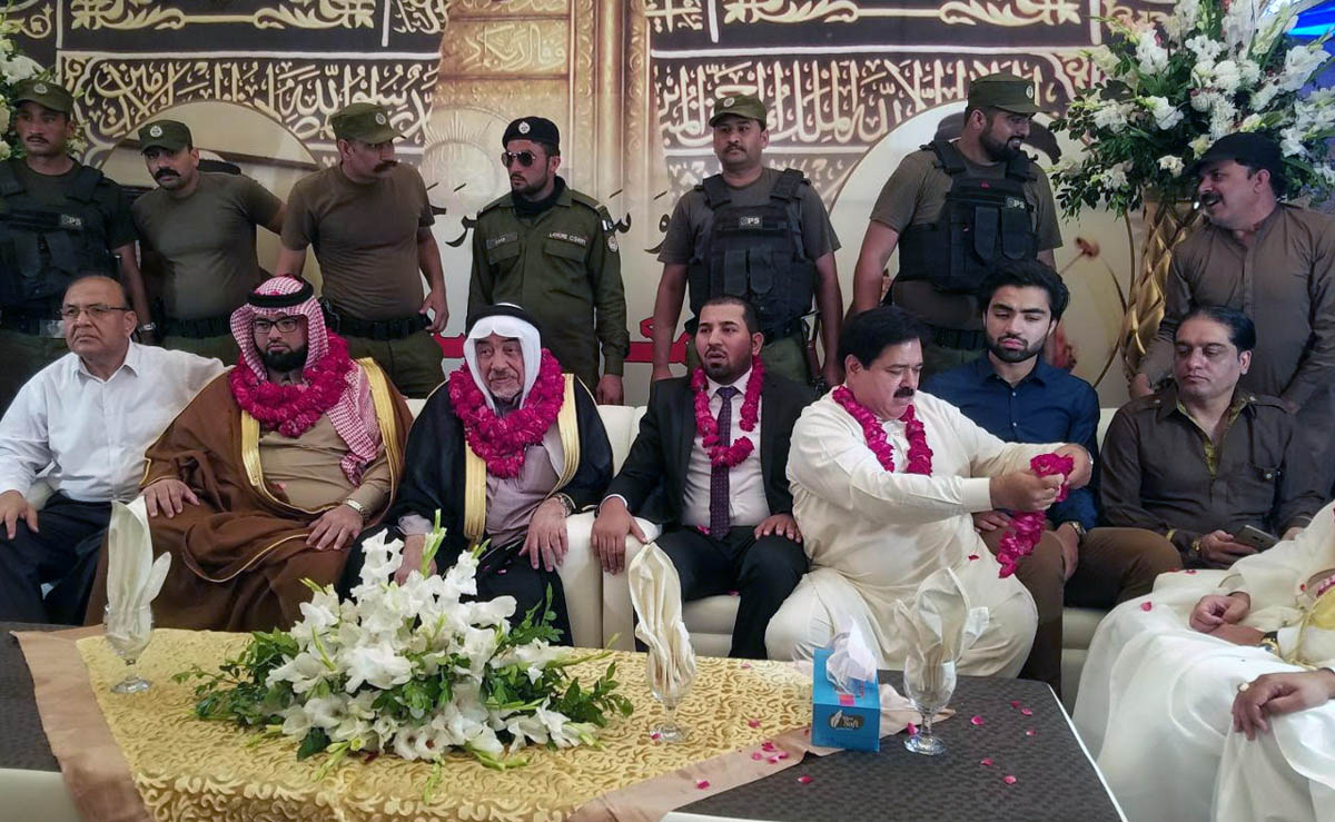 Kaaba keybearer Dr. Saleh Zainul Abaideen Al-Shaibi is received by his hosts Mian Abdur Rehman and Asif Butt at the Allama Iqbal International airport in Lahore. (Photo Courtesy: Mian Abdur Rehman, secretary to Dr. Saleh Zainul Abaideen Al-Shaibi)