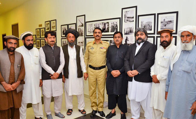 Representative of the affected traders from North Waziristan Agency tribal region met Major General Asif Ghafoor, director general of Inter Services Public Relations. (Photo by ISPR)