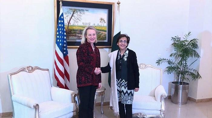 Alice Wells greets Tehmina Janjua in Islamabad. (Photo courtesy: Pakistan Foreign Office)