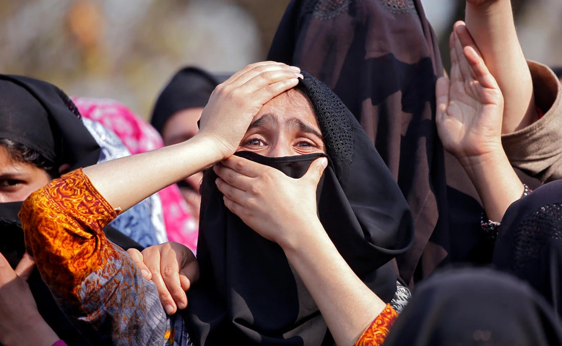 Women wail as they watch the body of Zubair Ahmed Turay being carried away during his funeral procession in south Kashmir’s Shopian district April 1, 2018. (REUTERS)