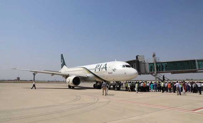 Passengers boarding the mock PIA flight at Benazir International Airport Islamabad. (Photo by Pakistan Civil Aviation Authority)