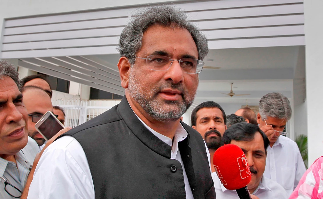 In this file photo, Pakistan’s Prime Minister Shahid Khaqan Abbasi arrives at the Parliament in Islamabad, Pakistan on July 31, 2017. (AP)