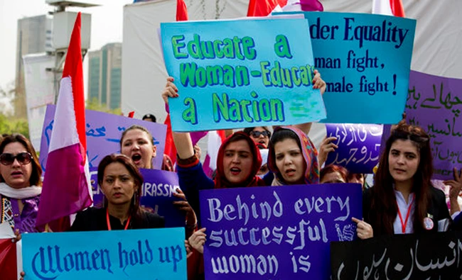 In this file photo, A Pakistani acid attack victim, center, takes part in a rally to mark International Women's Day in Karachi, Pakistan. (AP)