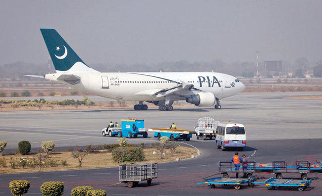 In this file photo, A Pakistan International Airlines plane prepares to take off at Alama Iqbal International Airport in Lahore. (REUTERS)